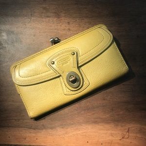 Mellow yellow: vintage coach wallet.
